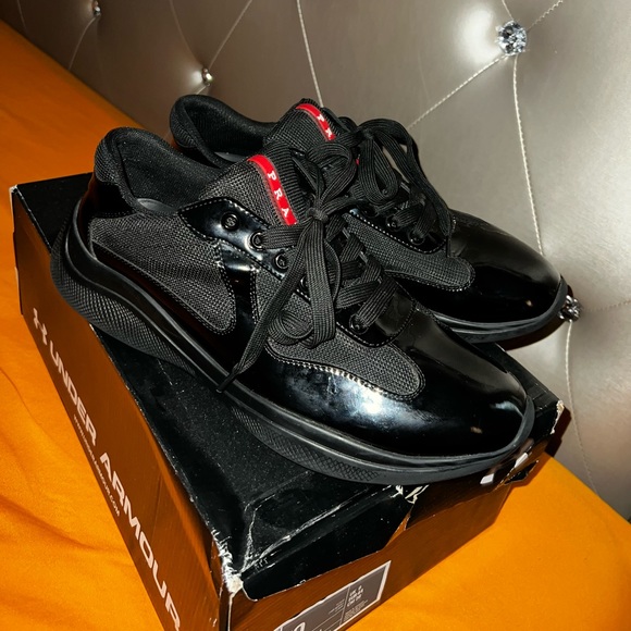 Brand new pare of Pradas. Use once.  No scratches good condition. - Picture 2 of 4